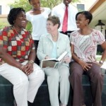 Patricia Attkisson, Public Affairs Officer at the US Embassy, Kingston (centre) points out interesting tidbits about the United States to winners of the 2009 Fulbright/LASPAU Scholarships.  They are (from left) Maureen Nelson, Vice Principal and Lecturer, Administration and Leadership, Montego Bay Community College; Nekeisha Spencer, Assistant Lecturer, Department of Economics, University of the West Indies, Mona; Andrew Gordon, Lecturer, Computer and Information Sciences at the University of Technology, Jamaica and Suzette Kelly, a Lecturer in Early Childhood Education at the Shortwood Teacher’s College. The four will take up scholarship at U.S. universities this academic year.