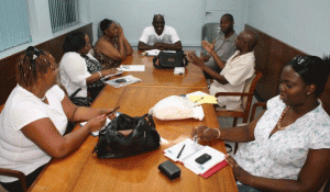 group From left are Marvelle Christie, Opal Daley, Joy Bell, Winston Bello Bell, Derrick Wilks, George Scott, Simone Gotti Harrison. Taking the photo is Mike Daley.