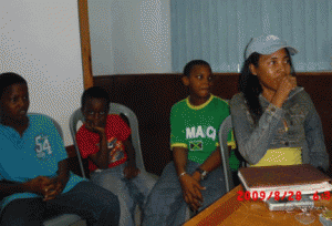 MIKE DALEY PHOTO: Youth pioneers from left Malik, Kershaun, LeVaughn and Anthea listen in.