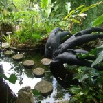 ERROL "SHAKKA" DAWES PHOTO: Mountambrin. Sculptures infront of the Bhudda Cottage of men too happy to take a dive.
